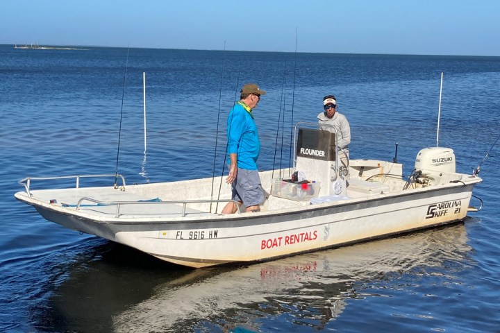 a small boat in a body of water